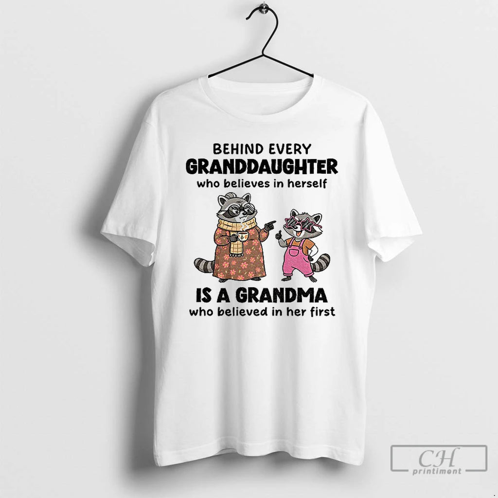 Classic Raccoon Behind Every Granddaughter Who Believes In Herself Is A Grandma Who Believed In T-Shirts, Hoodie, Sweatshirt