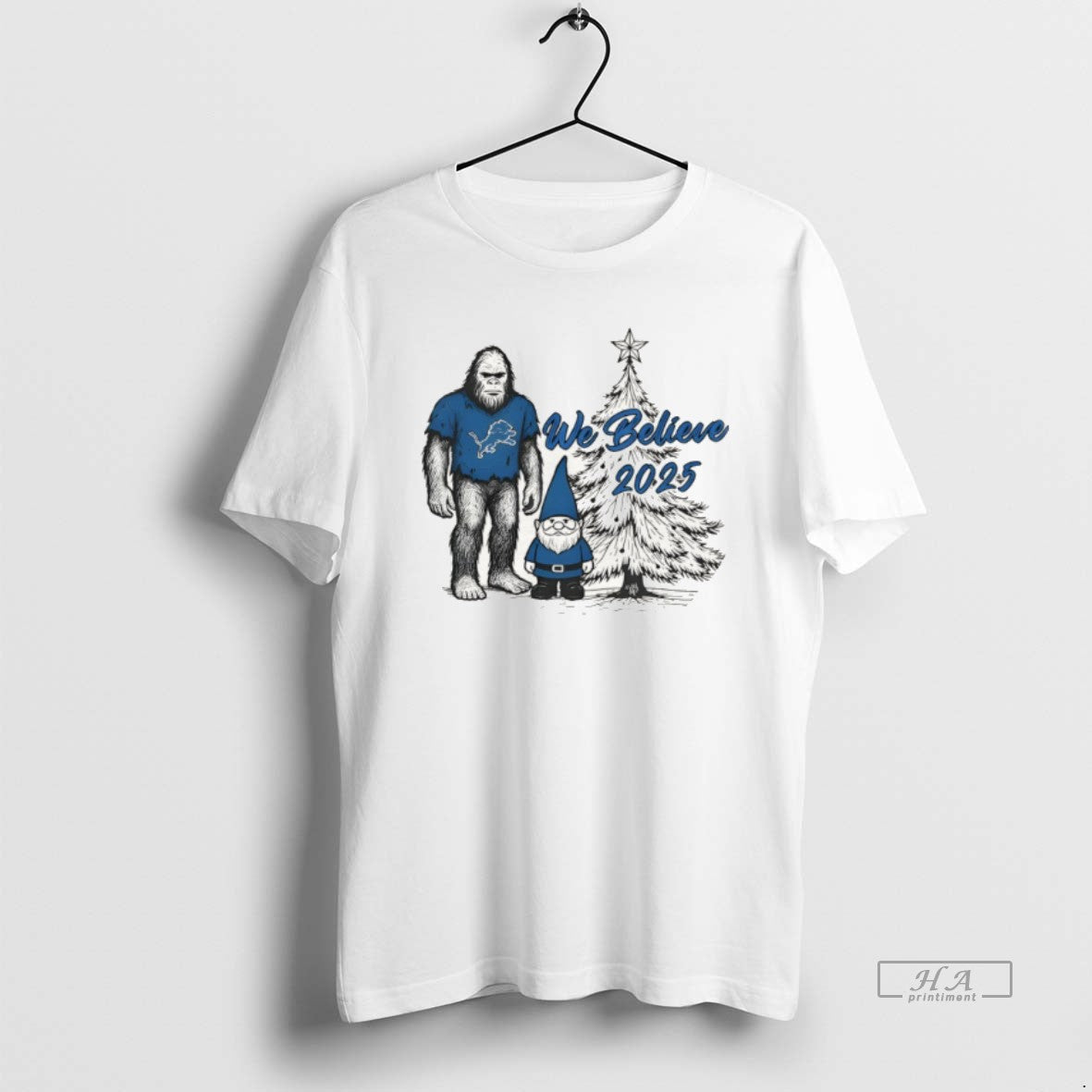 Official Detroit Football Big Foot And Gnome We Believe Christmas 2025 T-Shirts, Hoodie, Sweatshirt | InkNestWear.com