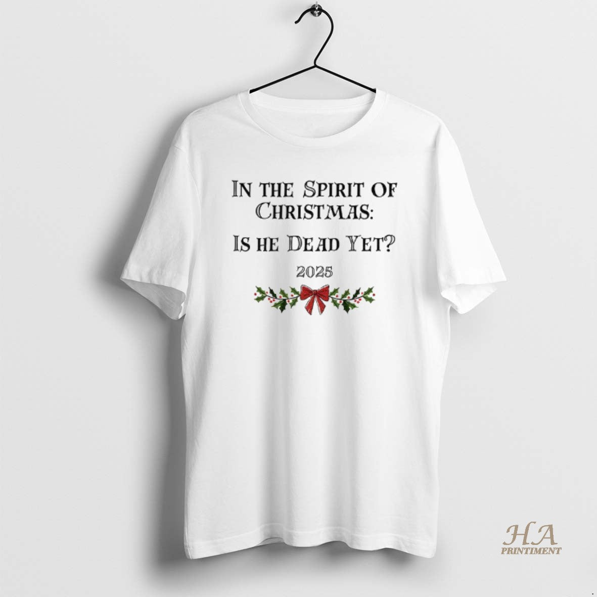 Official In The Spirit Of Christmas Is He Dead Yet 2025 Merry Christmas T-Shirts, Hoodie, Sweatshirt | InkNestWear.com