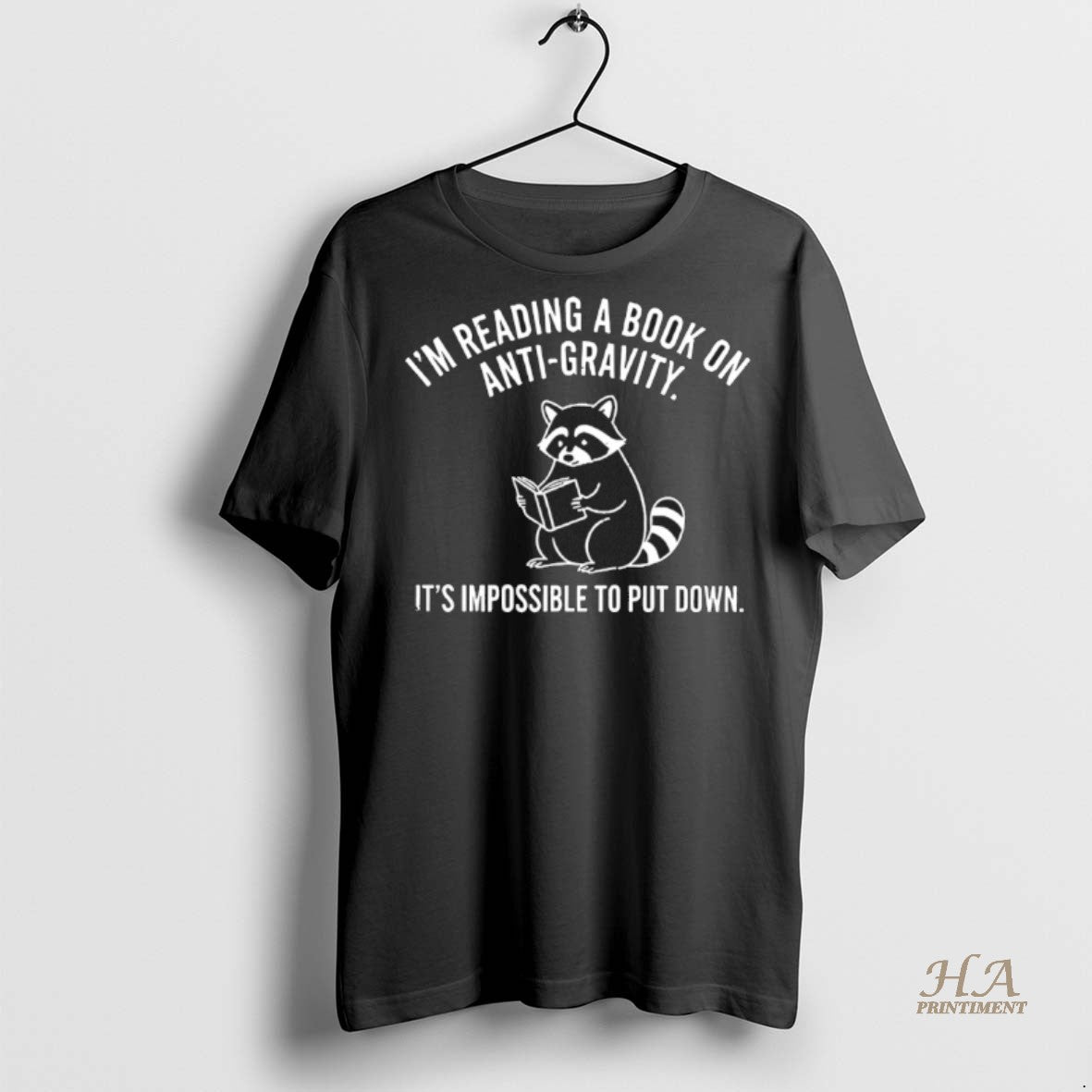 Official Raccoon Im Reading A Book On Anti Gravity Its Impossible To Put Down T-Shirts, Hoodie, Sweatshirt | InkNestWear.com
