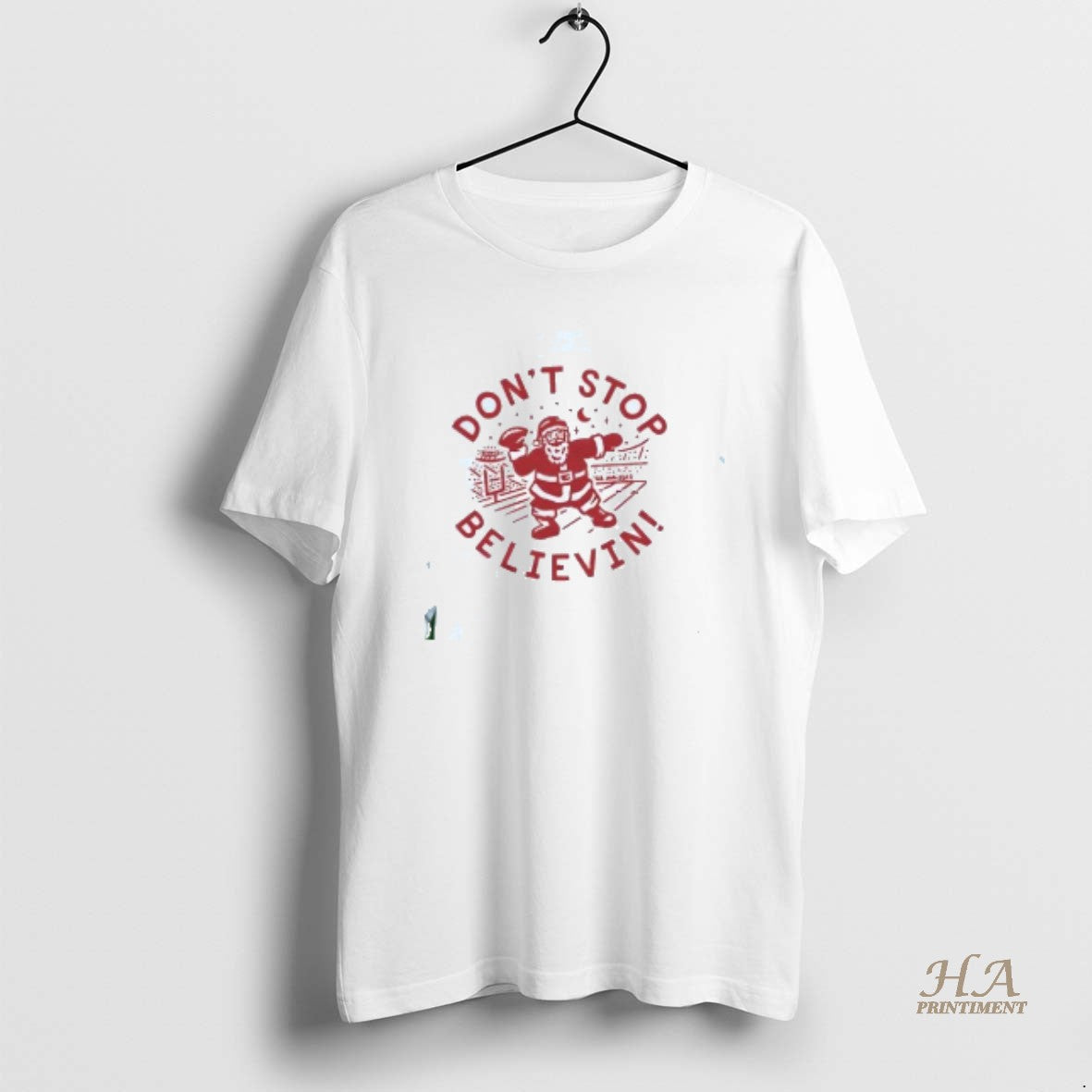 Official Santa Playing Football Dont Stop Believing Christmas T-Shirts, Hoodie, Sweatshirt | InkNestWear.com