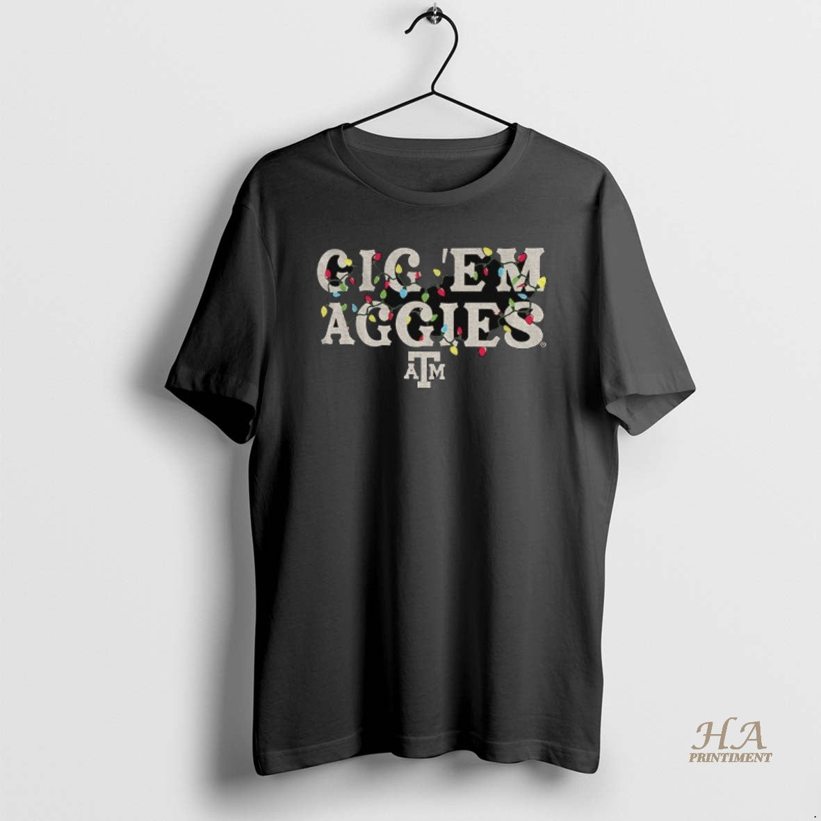 Official Texas Am Aggie Gig Em Christmas Light Merry Christmas 2025 T-Shirts, Hoodie, Sweatshirt | InkNestWear.com