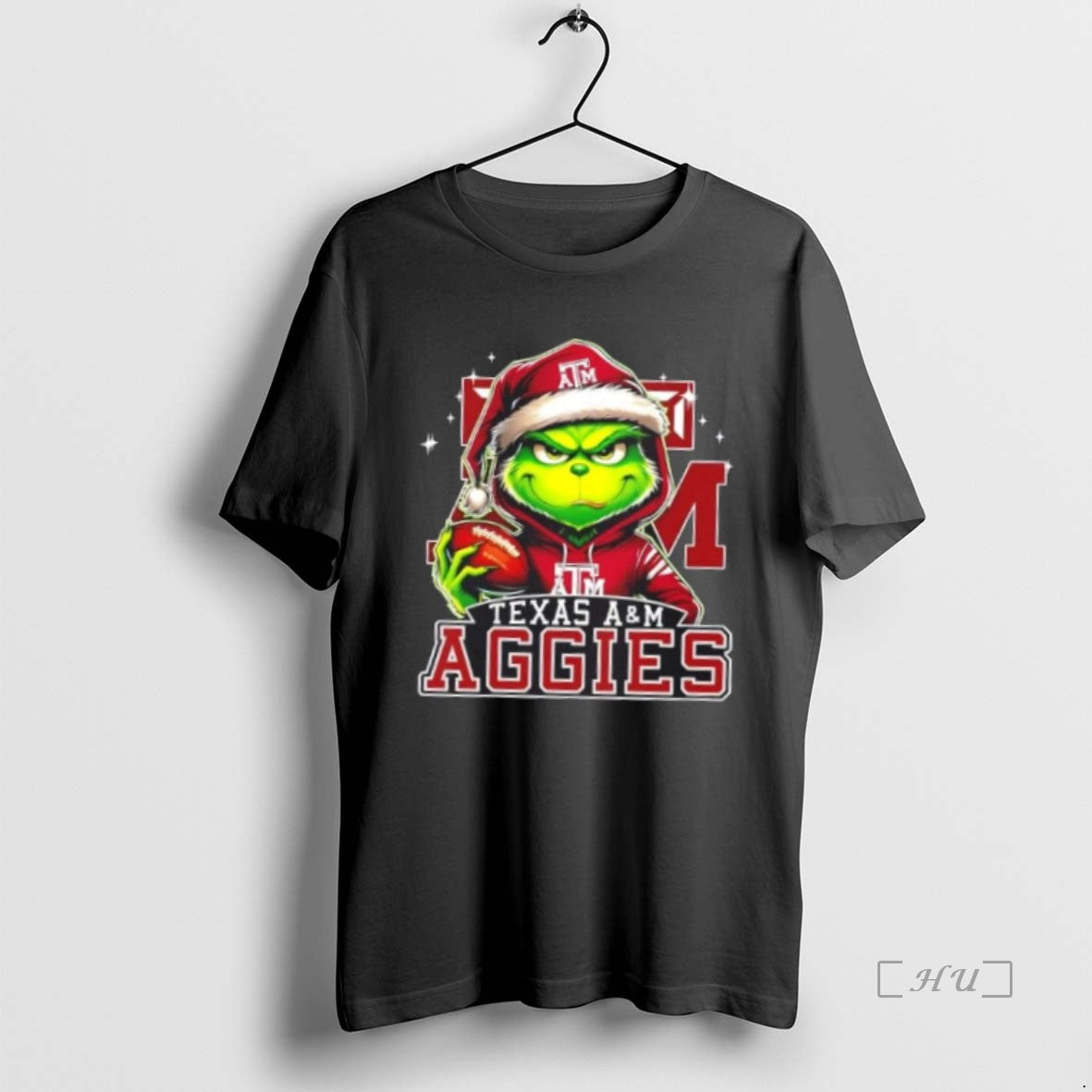Officials Grinch Is Holding A Ball And Smiling At Texas Am Aggies Fans Christmas Premium T-Shirts, Hoodie, Sweatshirt