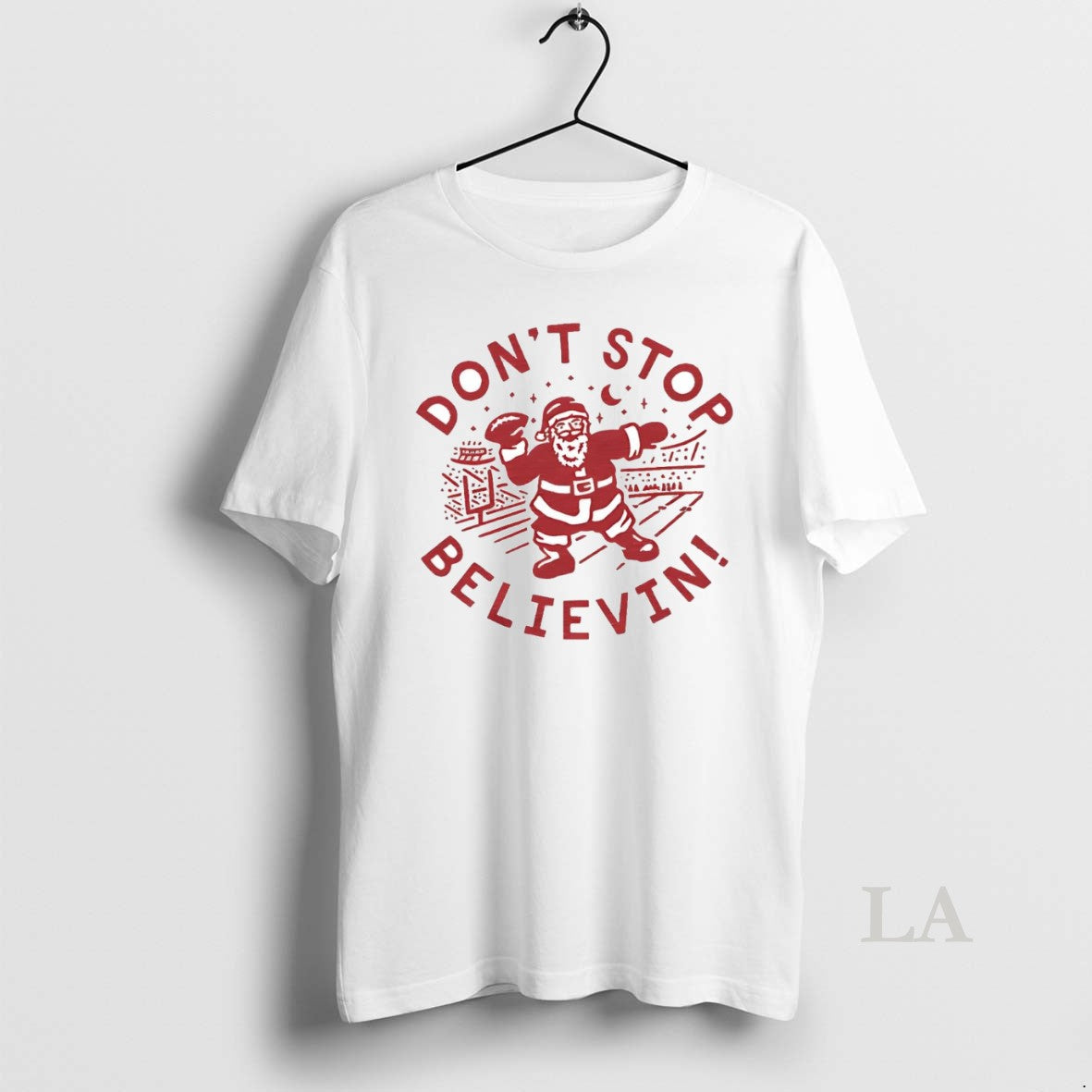 Original Santa Playing Football Dont Stop Believing Christmas T-Shirts, Hoodie, Sweatshirt | InkNestWear.com