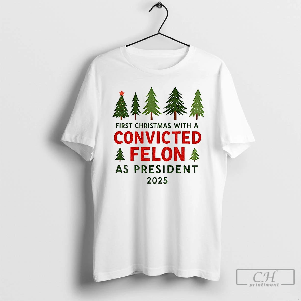 Premium Christmas Tree First Christmas With A Convicted Felon As President 2025 T Shirts Hoodie, Sweatshirt | InkNestWear.com
