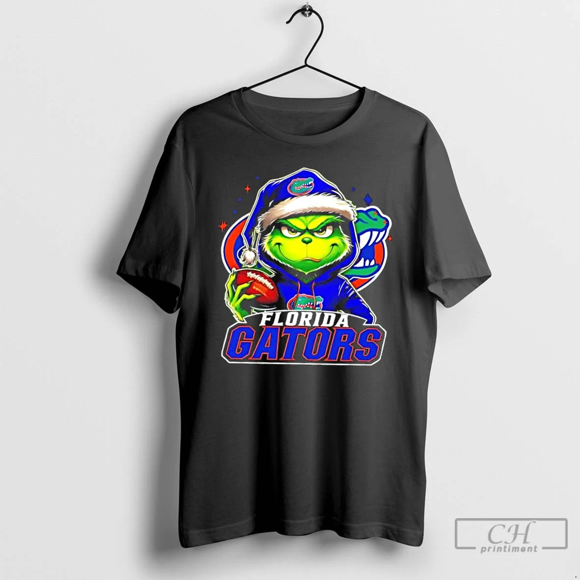 Premium Grinch Is Holding A Ball And Smiling At Florida Gators Fans Christmas T Shirts Hoodie, Sweatshirt | InkNestWear.com