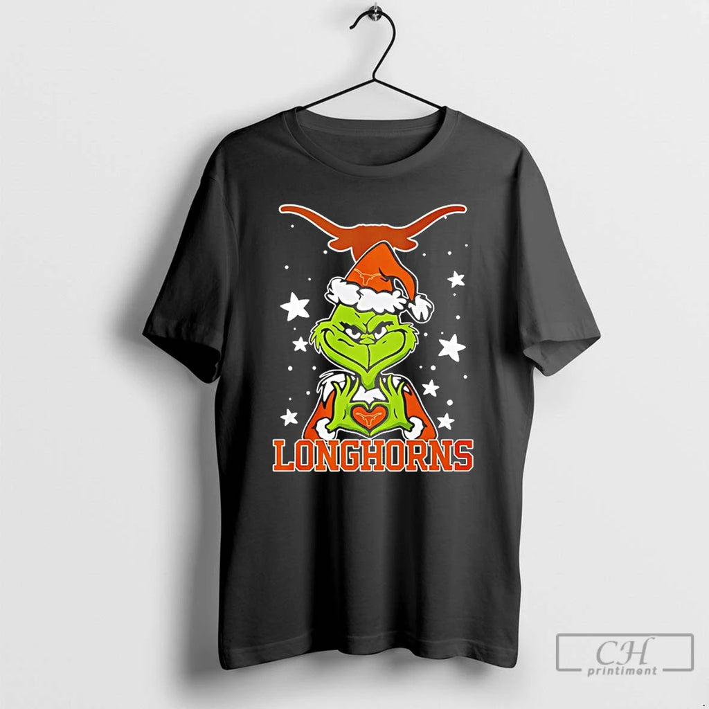 Premium Texas Longhorns Love Grinch Heart Hand Christmas 2025 T-Shirts, Hoodie, Sweatshirt | InkNestWear.com