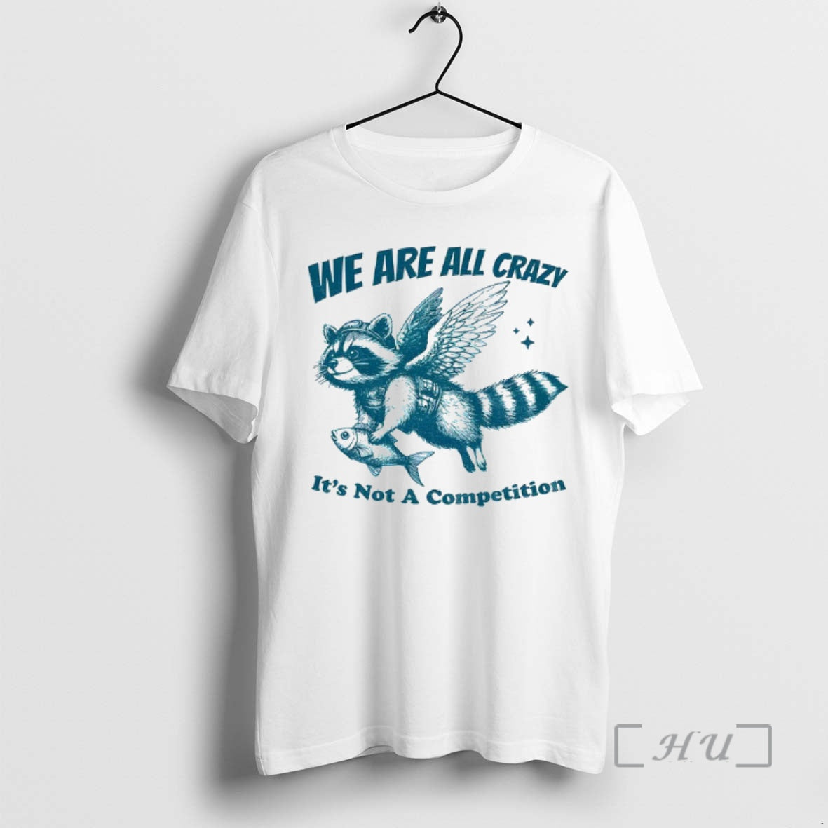 Trending Raccoon Holding Fish Fly We Are All Crazy Its Not A Competition Premium T-Shirts, Hoodie, Sweatshirt